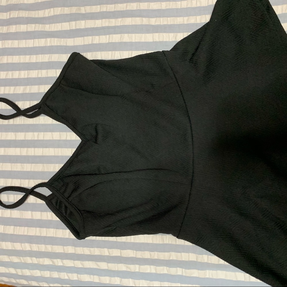 Black Sleeveless Peplum Top